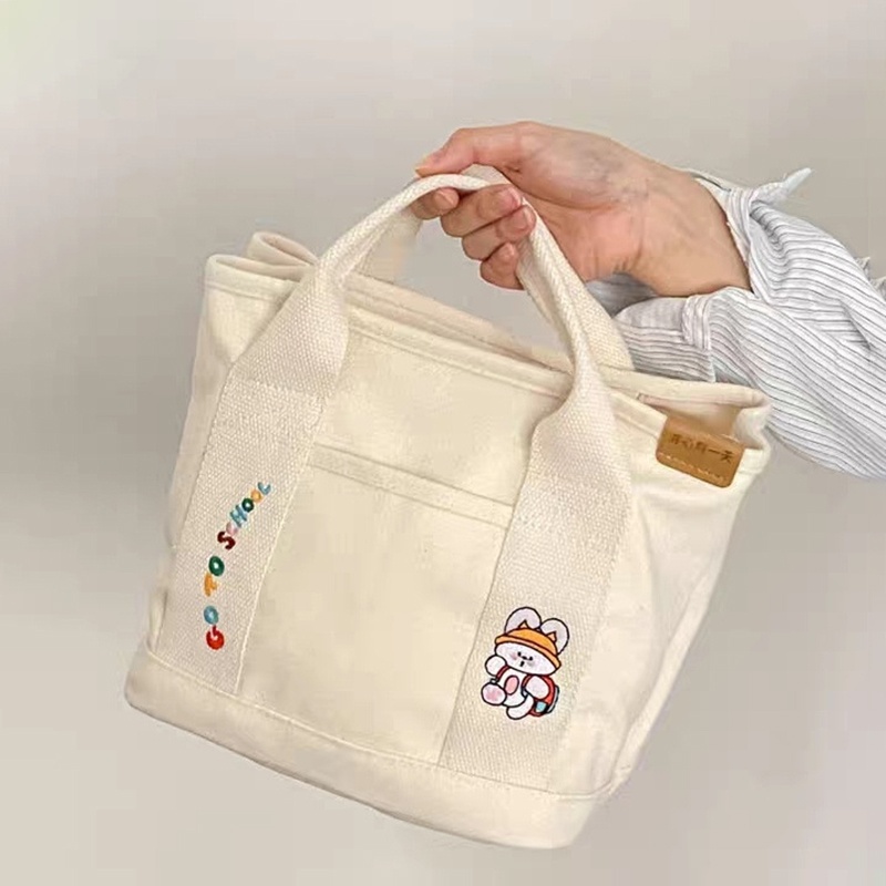 Túi Vải Canvas Hoạ Tiết Dễ Thương Đựng Đồ Bỉm Sữa Tiện Lợi Kích Thước 22*22*17 cm
