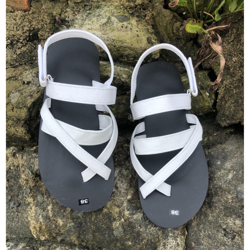 Sandal nam nữ đế đen quai trắng size từ 35 nữ đến 42 nam size khác nhắn tin chọn thêm