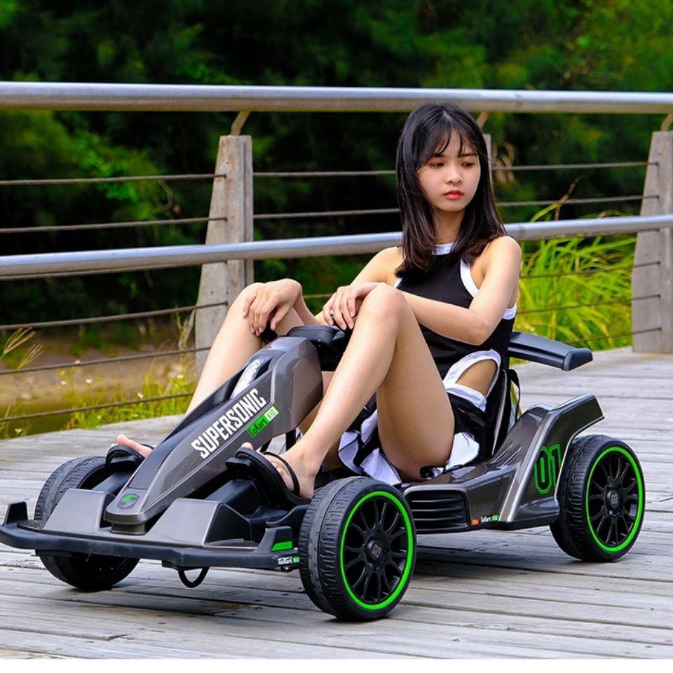 HOTNet nổi tiếng kart ô tô điện trẻ em bốn bánh xe drift có điều khiển từ xa xe đẩy trẻ em nam và nữ ô tô đồ chơi có thể