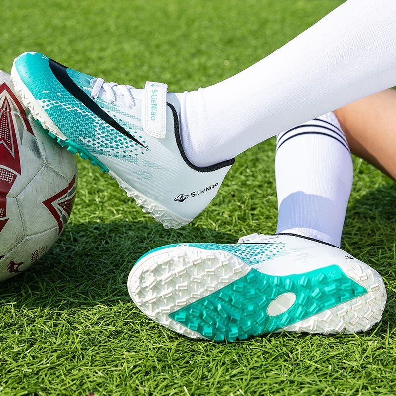 YANZISHOP trẻ em giày bóng đá chống trượt thoáng khí tf nghiền đinh cro nam và nữ 12 tiểu học học sinh trung học ag dài móng tay đào tạo giày