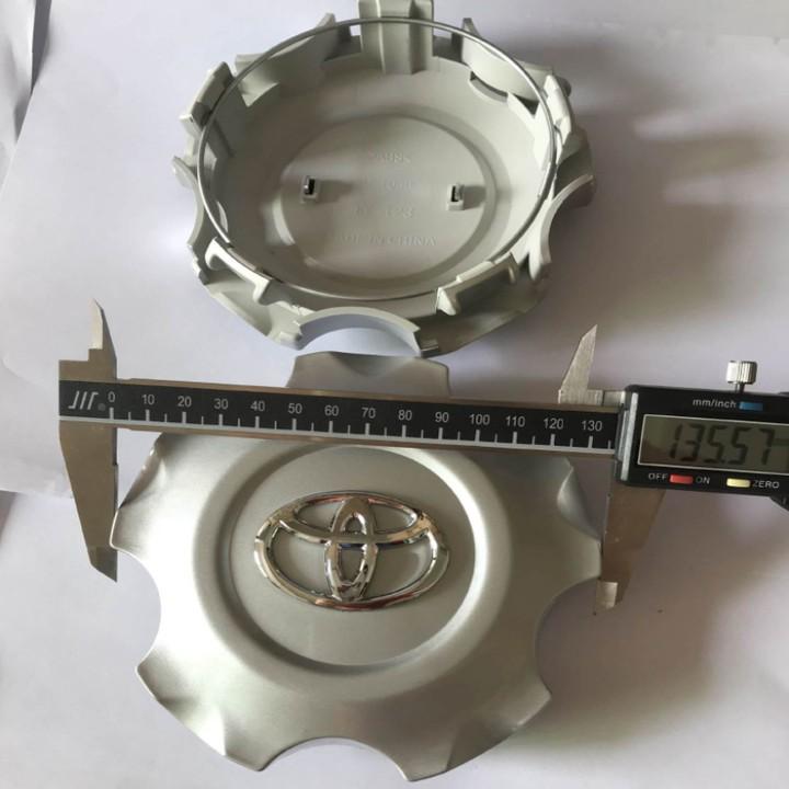 Logo chụp mâm bánh xe ô tô Toyota Land Cuiser Prado 2008-2010 TY-123