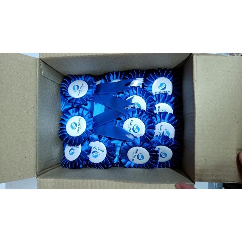 Hoa cài áo đại biểu