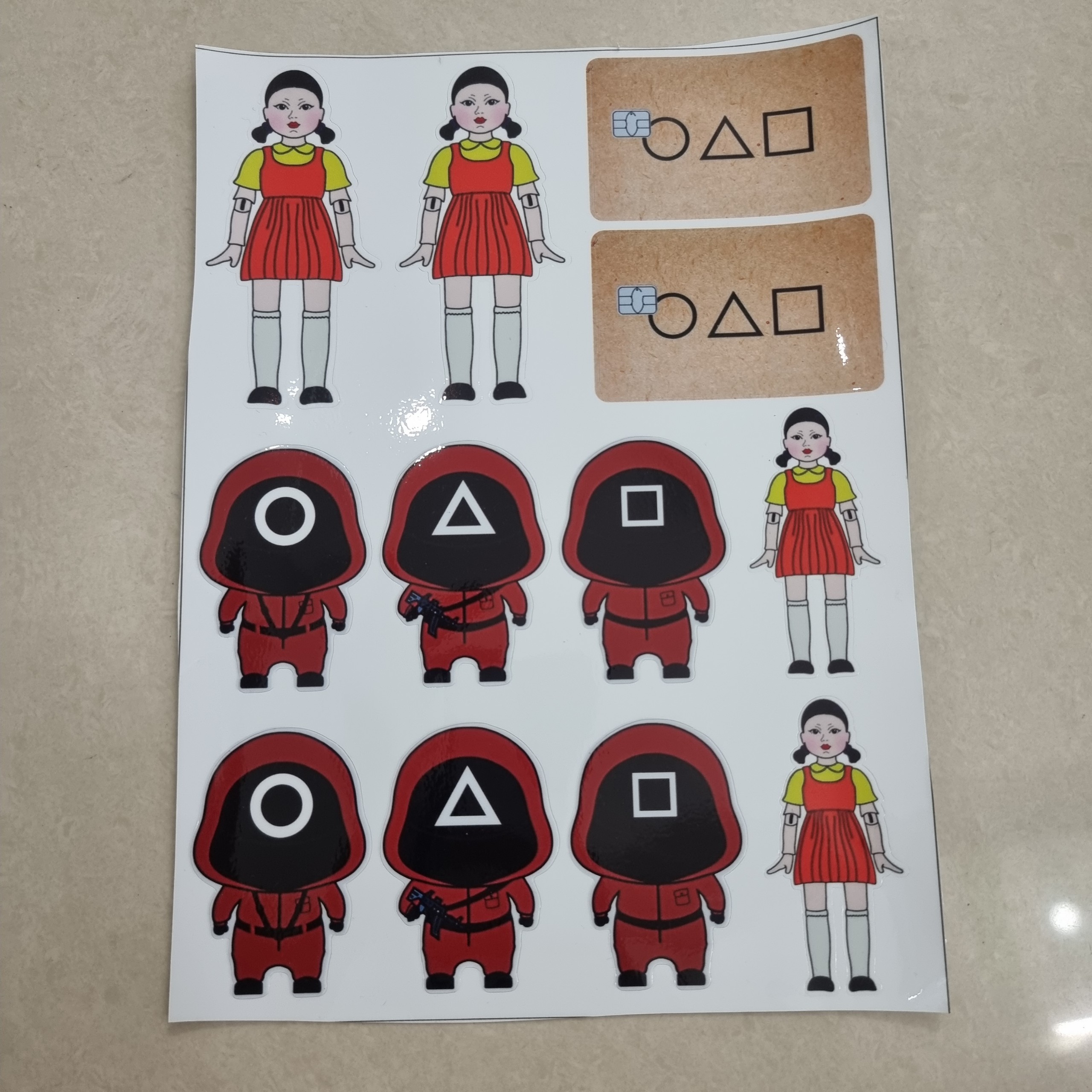 Tem logo sticker trò chơi con mực 1 tấm 18x25cm