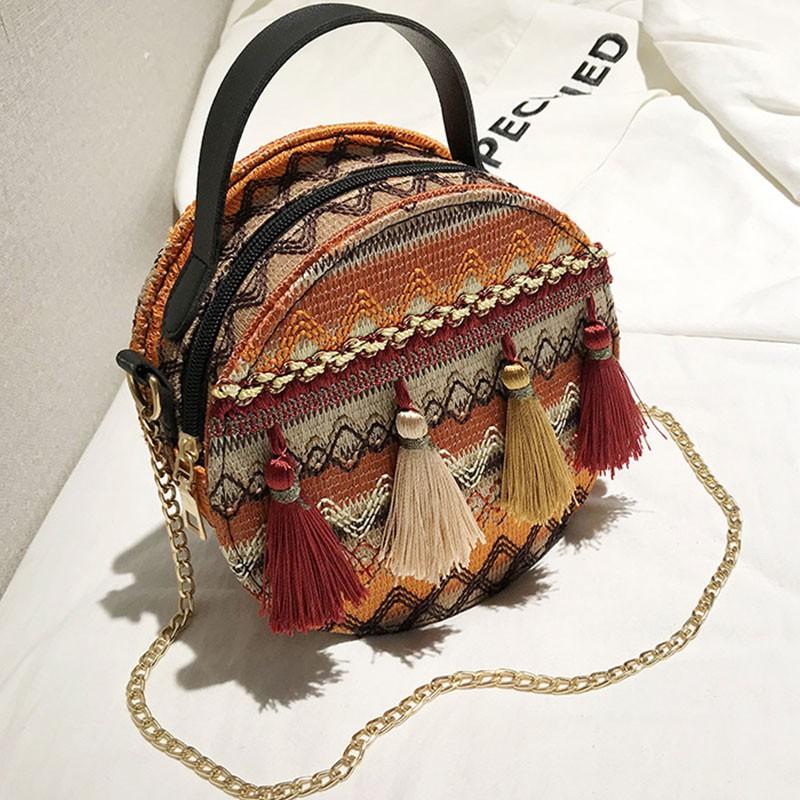 Túi xách dây xích đeo vai hoạ tiết in phối tua rua
