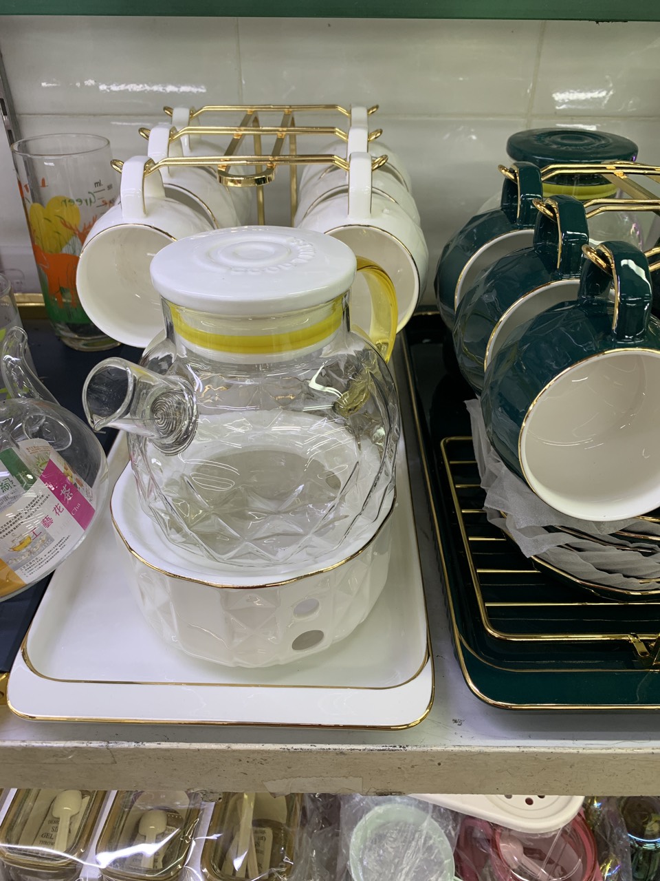Bộ ấm pha trà thủy tinh khay sứ, đế châm nến, 6 cốc, 6 đĩa và giá treo cốc - VD49