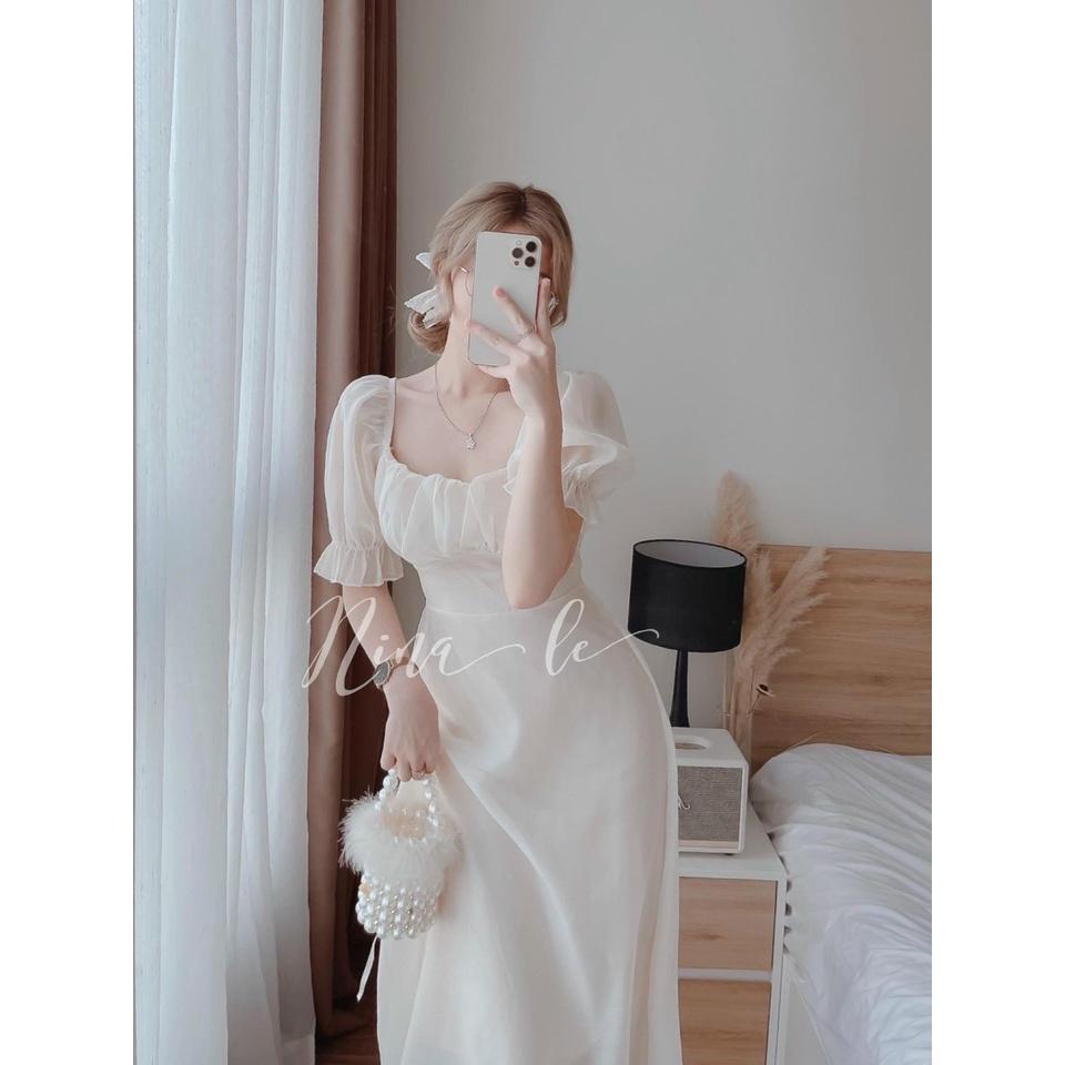 Đầm trắng xoè tiểu thư cổ vuông tay phồng xếp ly ngực