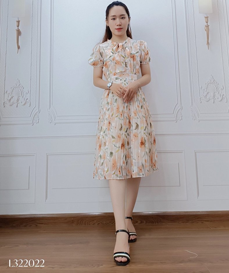 Váy tơ hoa vàng to cổ nơ tay bo chun dập ly