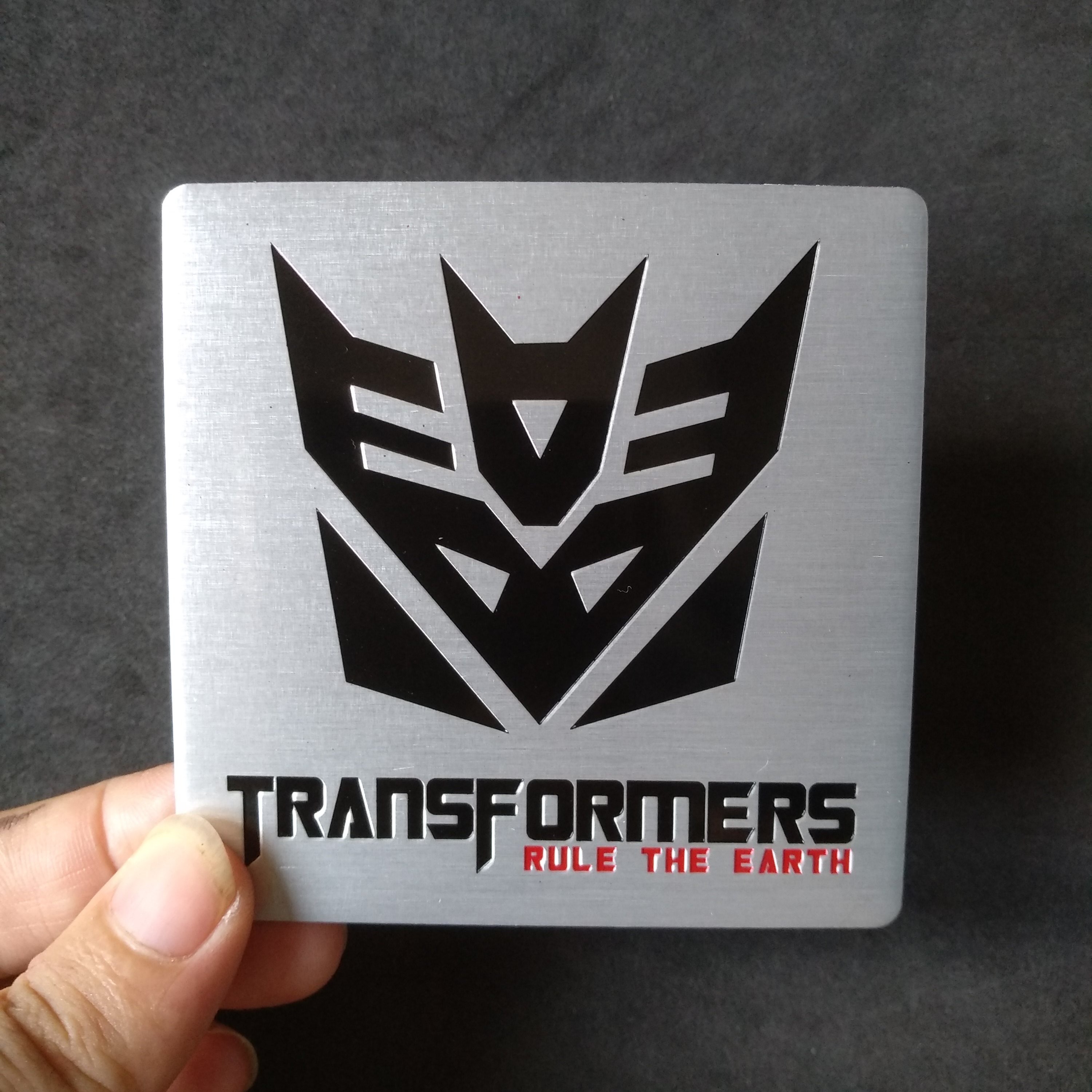 Miếng dán kim loại hình TRANSFORMERS DECEPTICON rule the earth 8cm