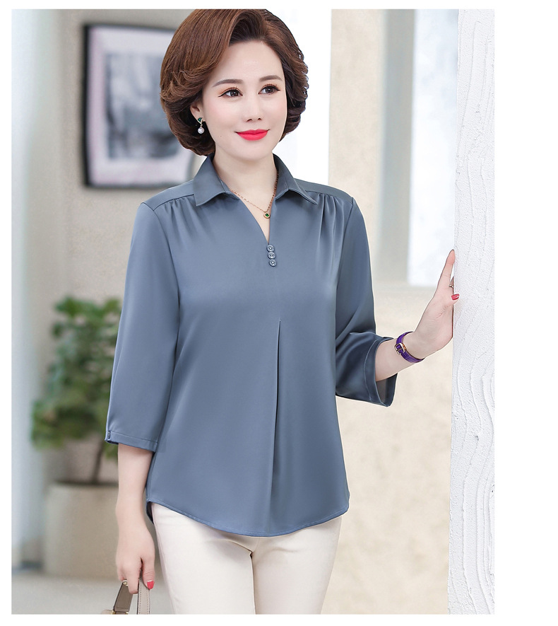 Áo sơ mi trung niên vai rúm mềm mại.