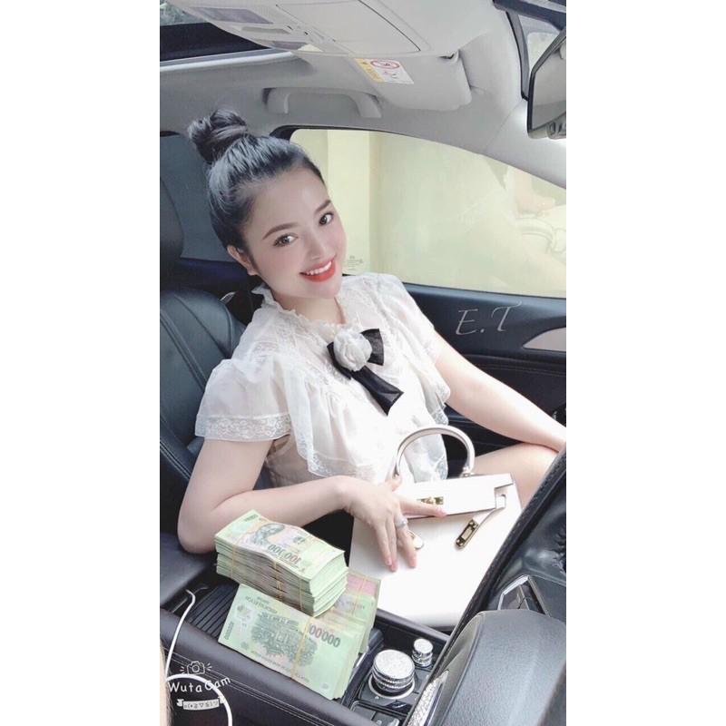 Áo sơmi hoa trà cộc tay