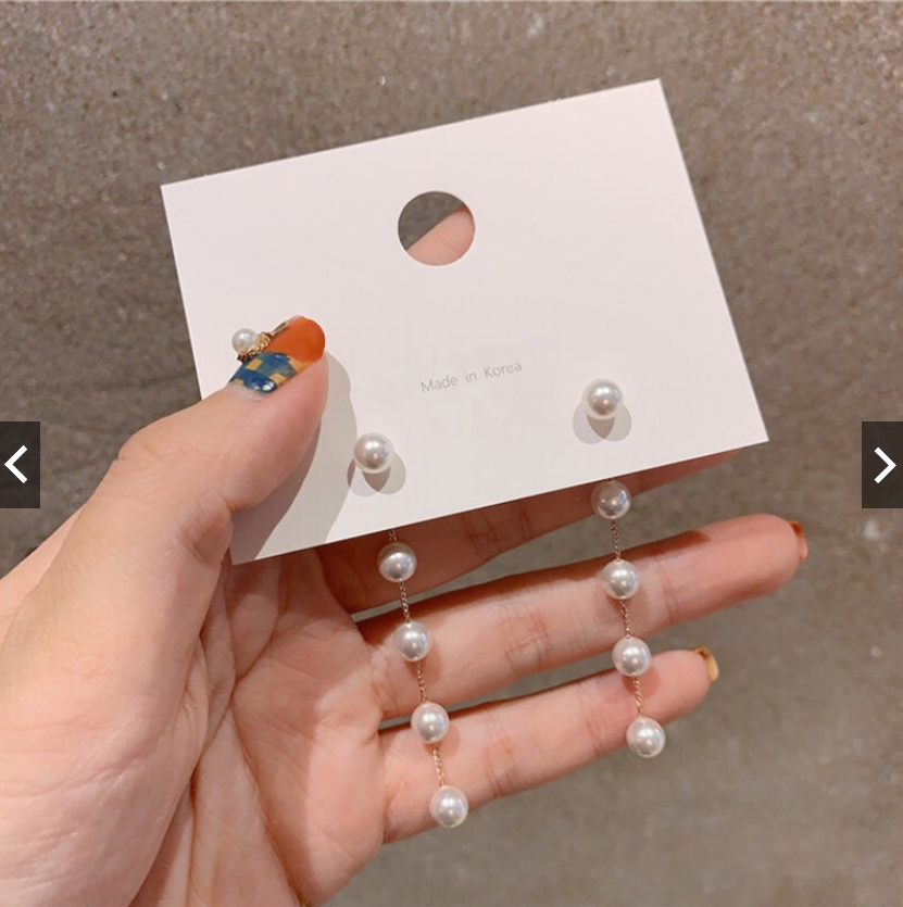 Đôi khuyên tai dài đính ngọc trai nhân tạo thời trang xinh xắn cho nữ.
