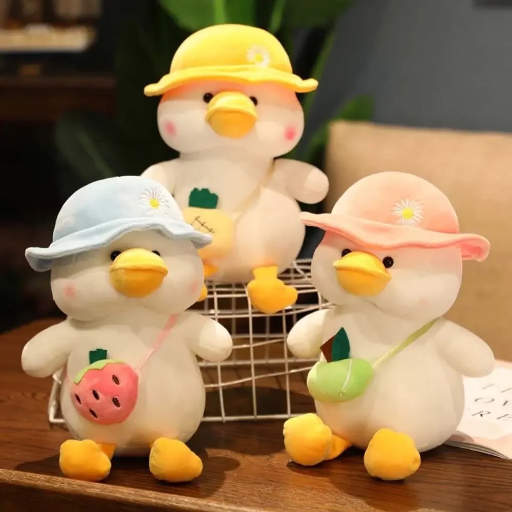 Thú nhồi bông vịt đeo túi đáng yêu - Size 22cm - Quà tặng gấu bông vịt đội nón êm mịn