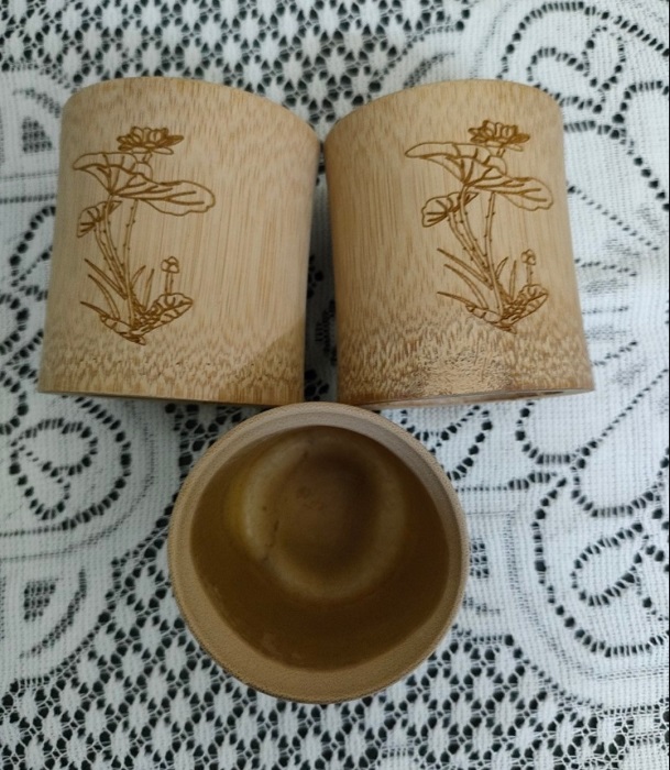 Cốc tre đựng gạo trong mâm cúng thôi nôi đầy tháng