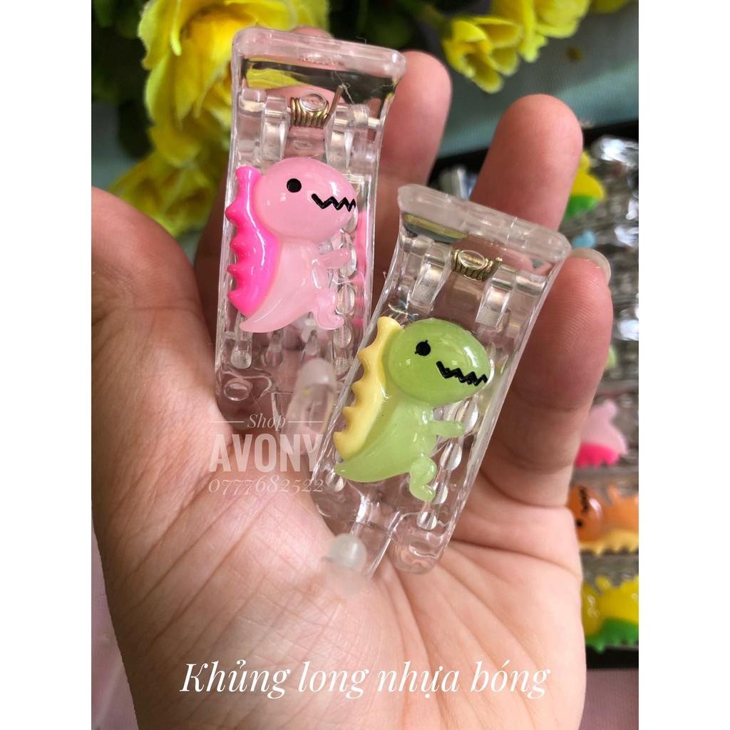Kẹp tóc răng dẻo trong đính icon khủng long
