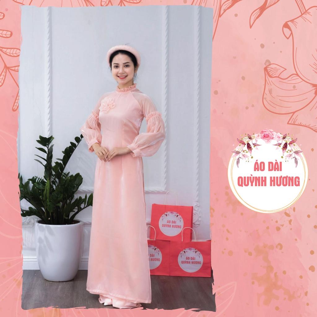 Áo dài voan hồng cam tay bồng chun cách điệu
