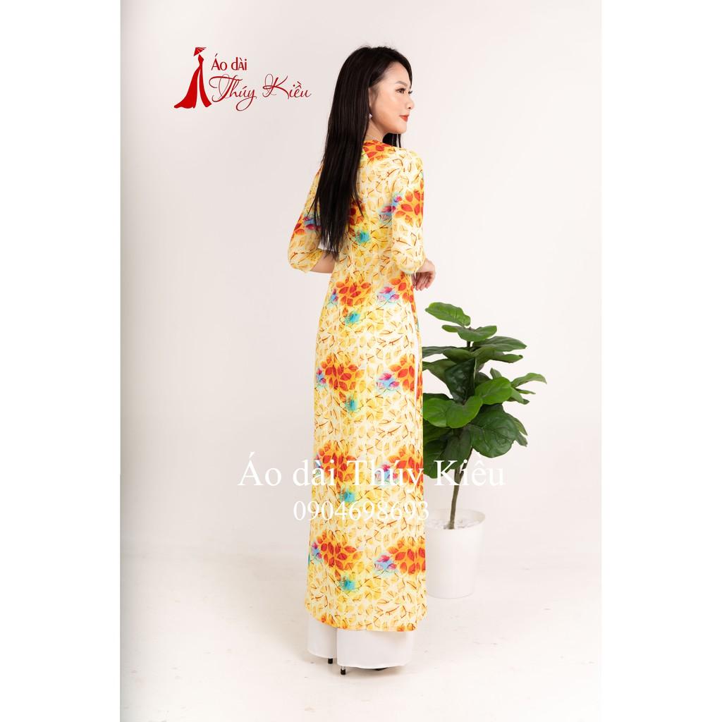 Áo dài Thúy Kiều in 3D lụa Nhật màu vàng lá đỏ K18