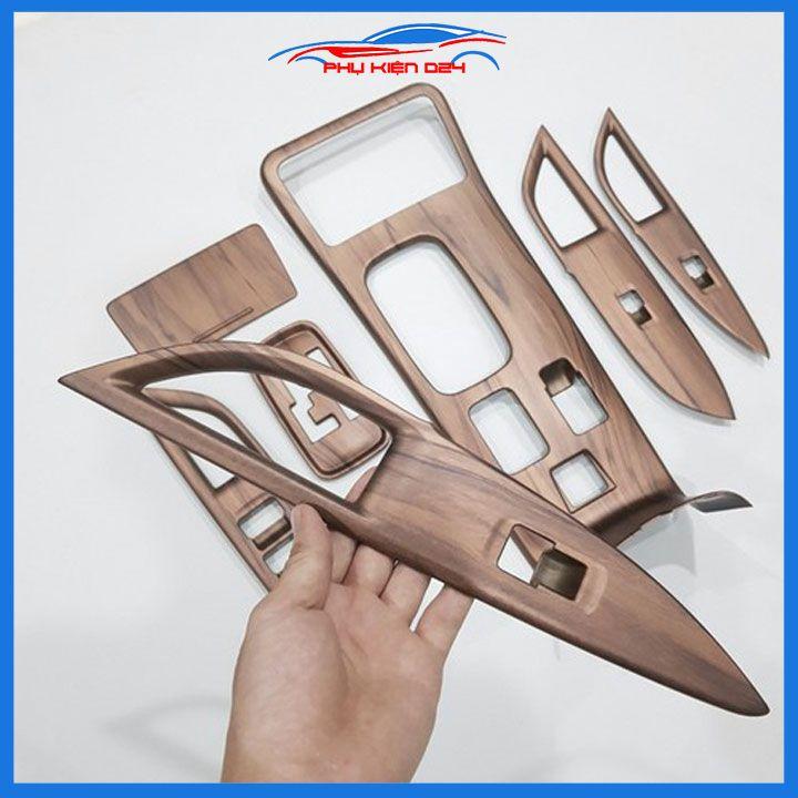 Ốp nội thất Outlander 2018-2019-2020-2021-2022 phanh tay điện tử vân gỗ chống xước làm đẹp xe