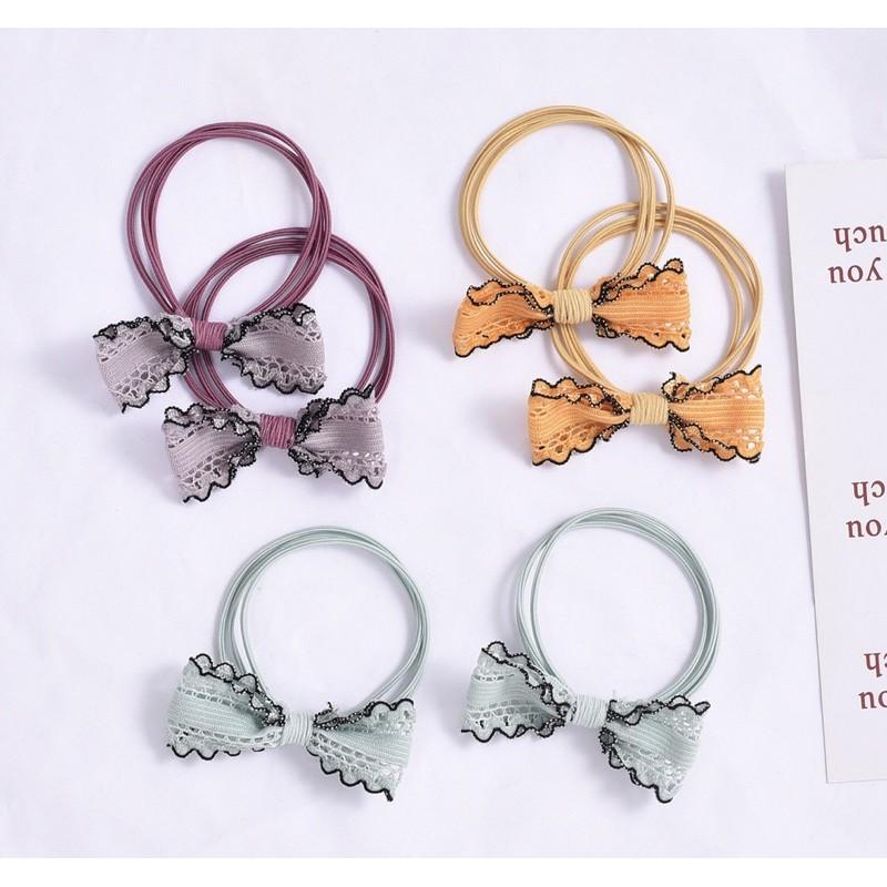 Thun buộc tóc hình nơ