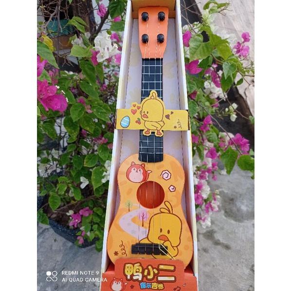 Đàn Guitar Mini Đa Màu Sắc Kích Thích Sự Vui Chơi Của Bé Với Âm Nhạc. Đàn ghita vui nhộn cho bé