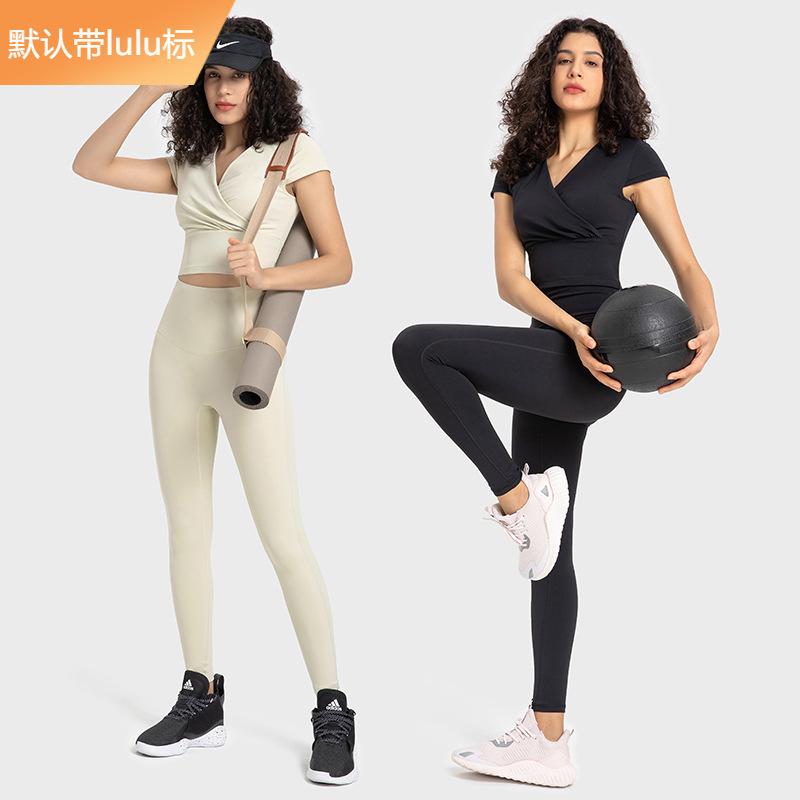 Phong cách bùng nổ Lulu lulu mùa xuân và mùa hè mới của phụ nữ cổ chữ V xếp li thể thao quần áo yoga ngắn tay màu nude có miếng đệm ngực
