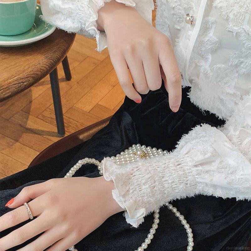 Áo kiểu tay dài phối nút thiết kế cổ chữ V thanh lịch