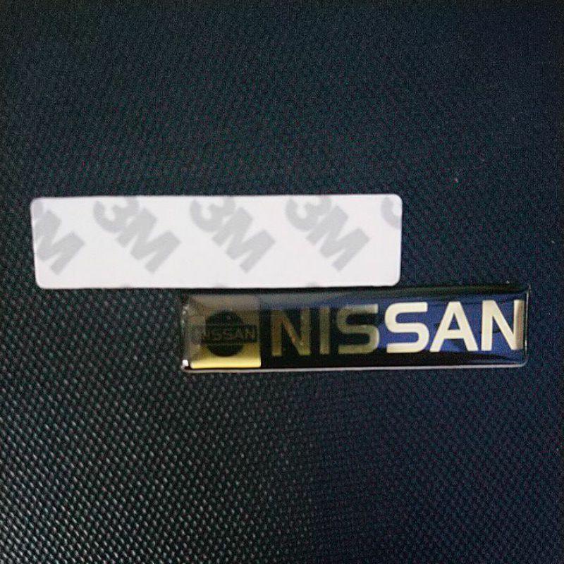 Tem biểu tượng Nissan