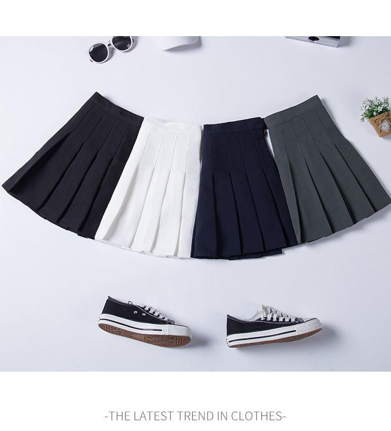 SHUANGYAN Váy xếp nếp nữ xuân hạ váy ngắn màu đen âu phục sinh viên ngắn eo cao chữ A lộ ra gầy nửa người váy