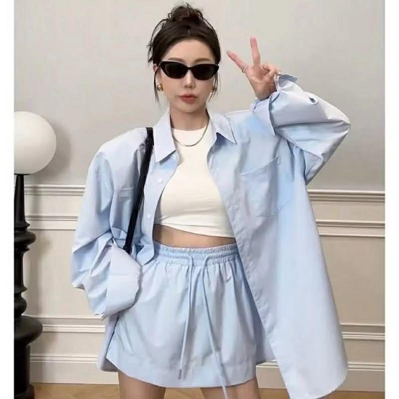 Bộ Áo sơ mi dài tay và chân váy ngắn dáng dài oversize màu xanh da trời cho nữ