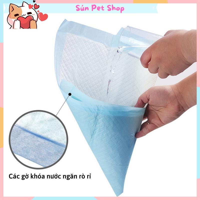 Tã lót chuồng cho chó mèo đi vệ sinh