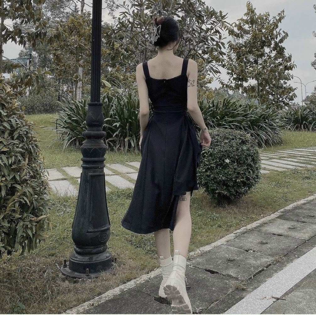Đầm đen xoè 2 dây tà lệch đan dây eo