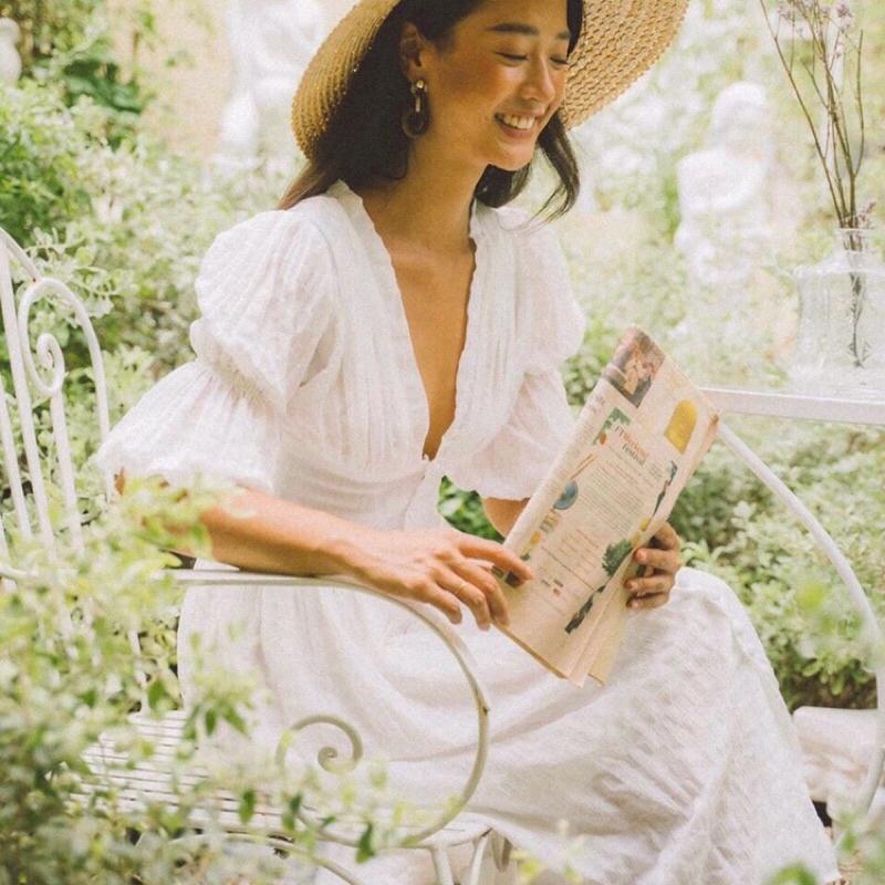 Đầm xốp trắng cổ V nút bọc có size