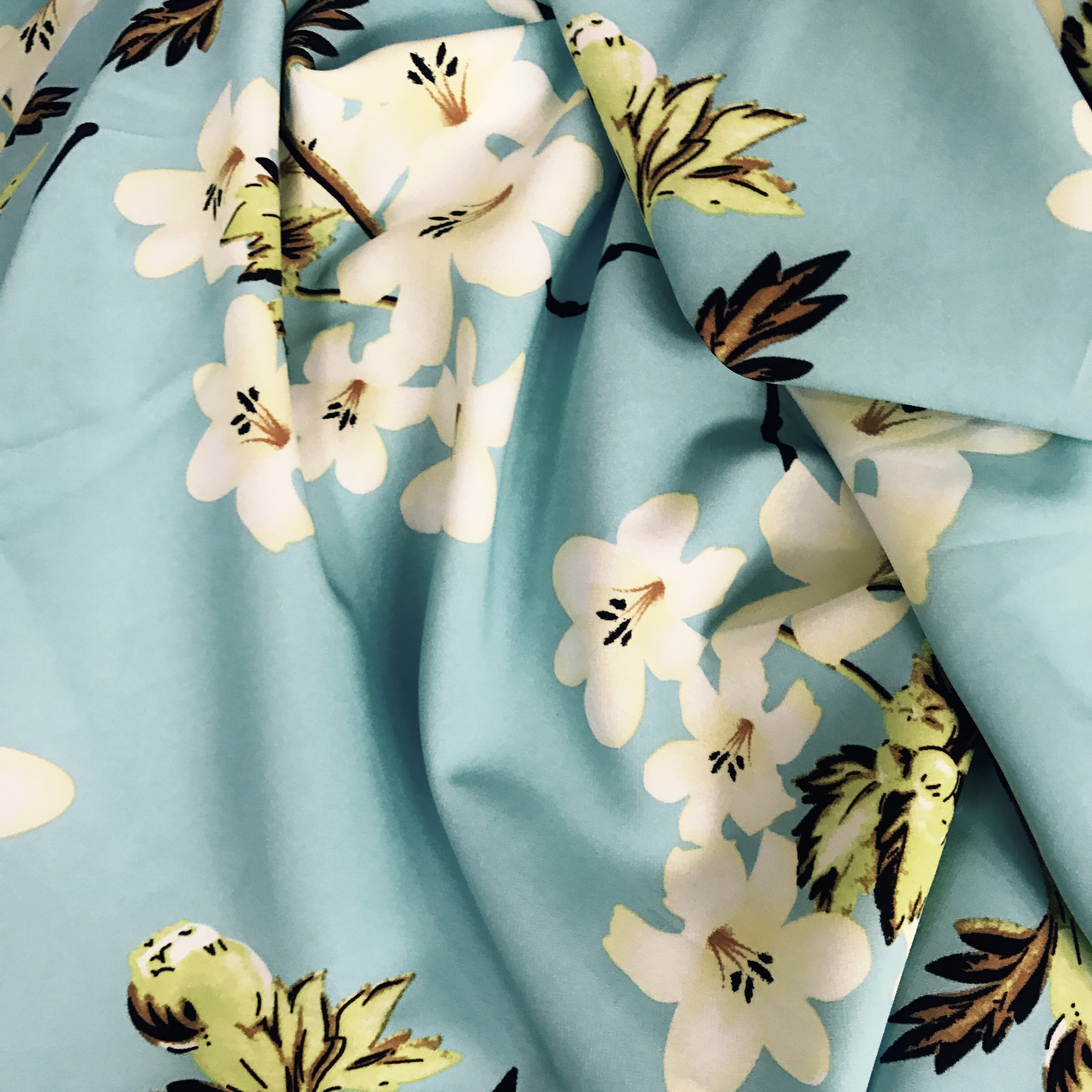 Vải thun gấm dày mềm co giãn nhẹ 4 chiều họa tiết hoa lily nền xanh lơ