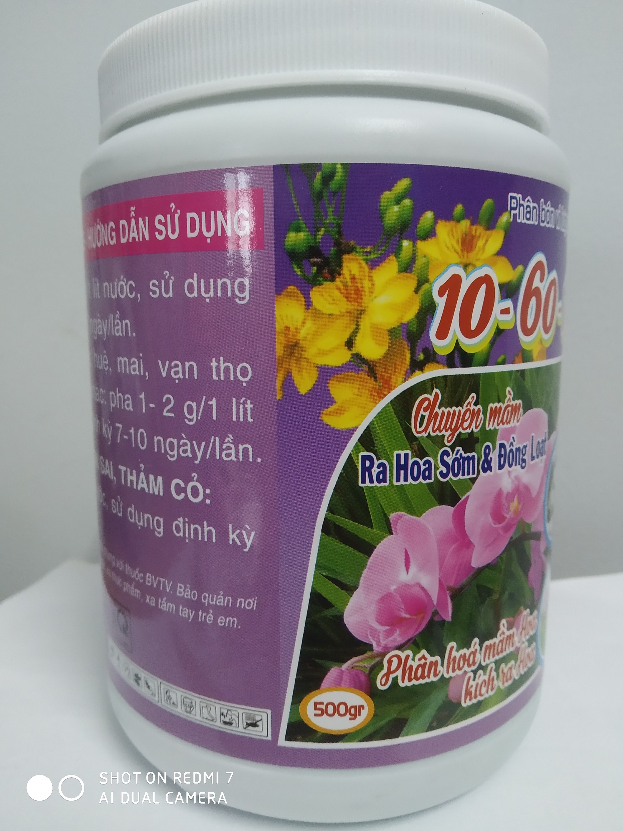 Phân bón vi lượng NPK 10-60-10 kích ra hoa sớm và đồng loạt - chai 500 gram Biomax