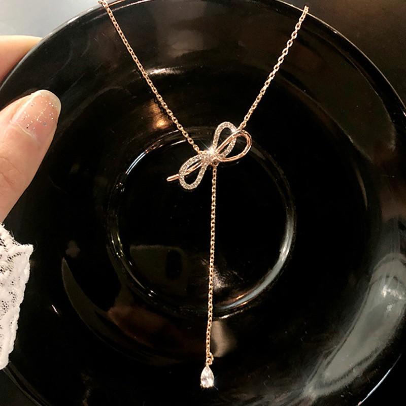 Dây chuyền trang trí mặt nơ đính đá xinh xắn