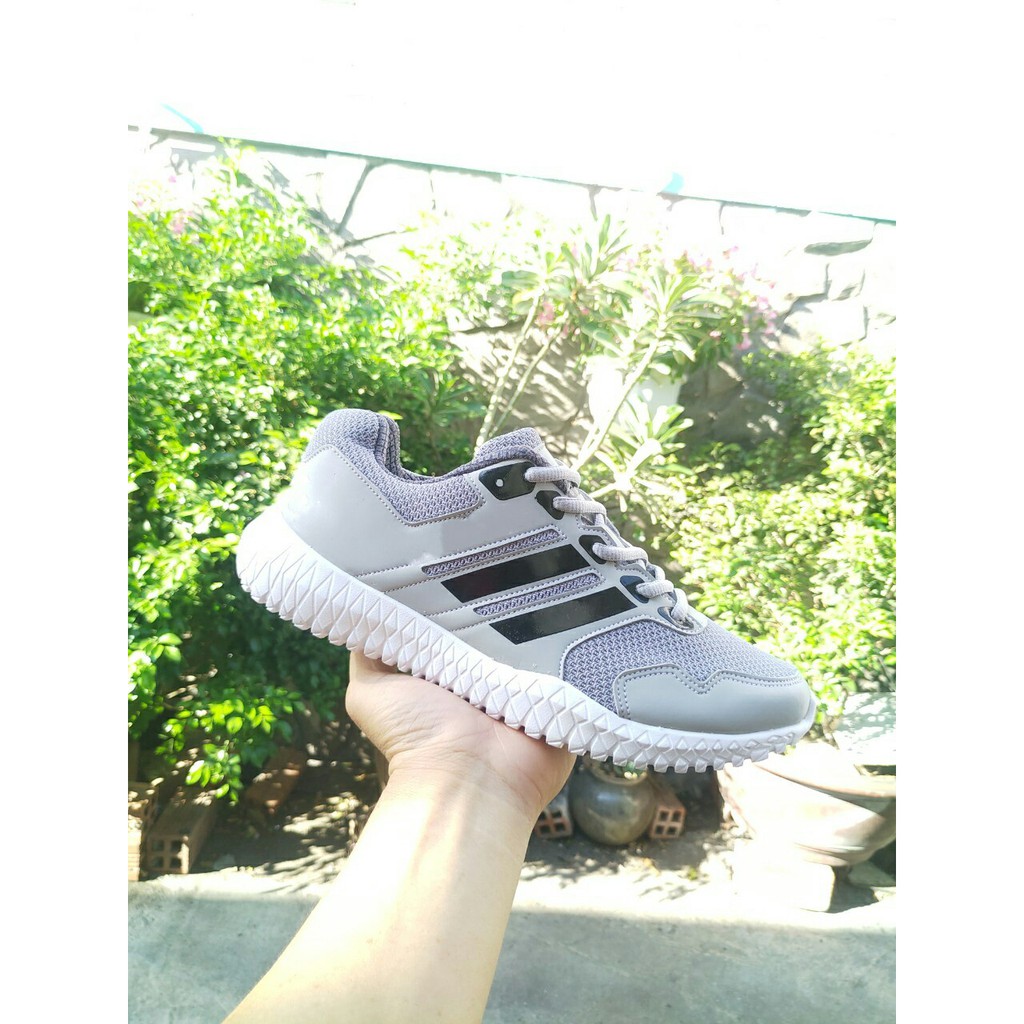 Giày thể thao nam và nữ xám sọc đen, giày nhẹ êm, có đủ size từ 35-44