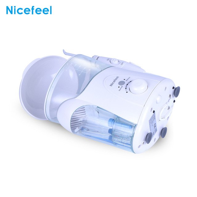 Máy tăm nước gia đình Nicefeel FC288W có chức năng massage, hộp đựng đầu phun bên hông máy không có tia UV