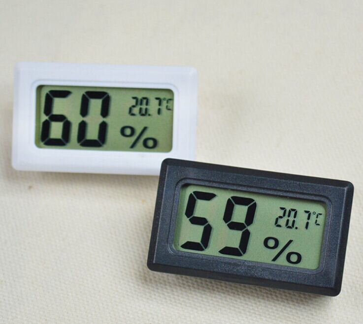 Nhiệt ẩm kế mini đo nhiệt độ độ ẩm trong nhà, xe hơi, văn phòng nhỏ gọn tiện ích, chính xác cao- kèm pin (Màu đen- trắng giao màu ngẫu nhiên)