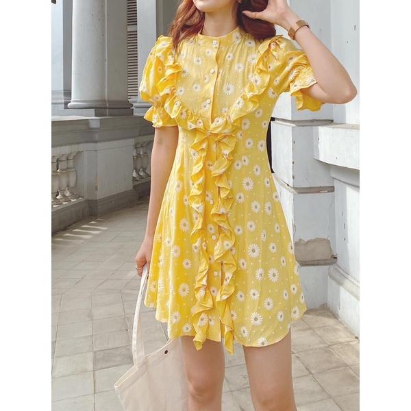 Đầm hoa vàng cổ trụ