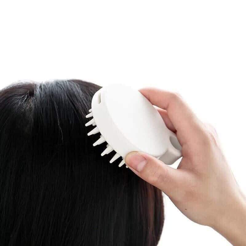 Lược gội đầu massage gai silicon