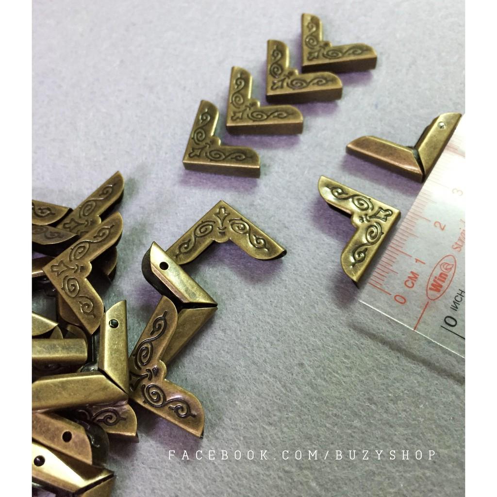 Bọc góc sổ màu đồng 2cm
