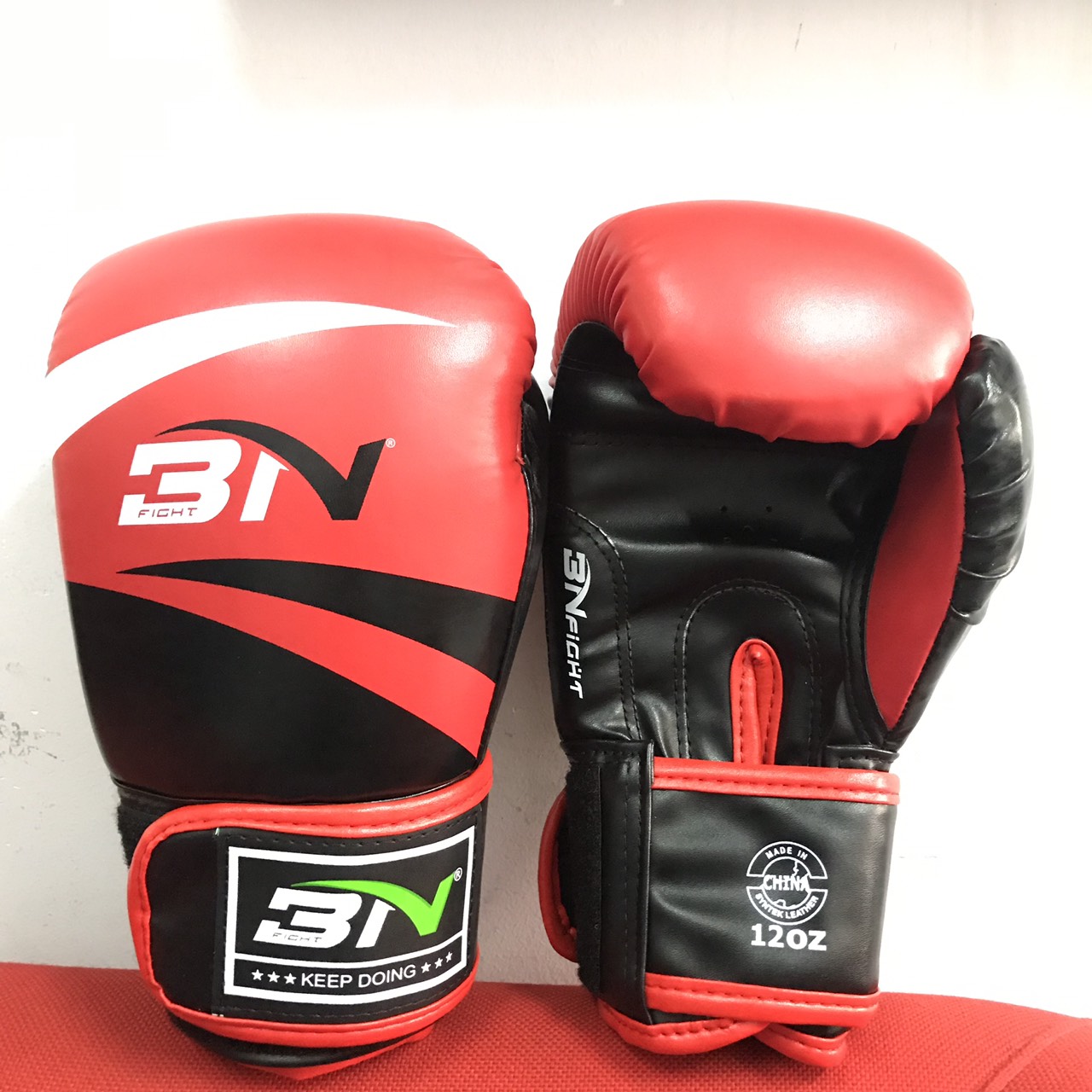 Găng Boxing BN-VN Keep doing cao cấp có 03 size và 2 màu lựa chọn giá tốt nhất thị trường  – đỏ đen – 12oz 60-80kg
