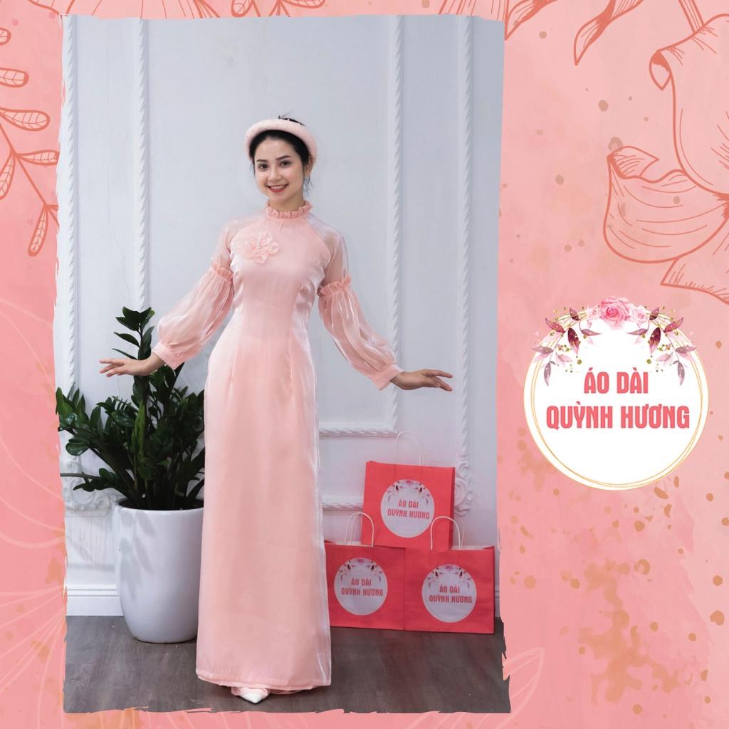 Áo dài voan hồng cam tay bồng chun cách điệu