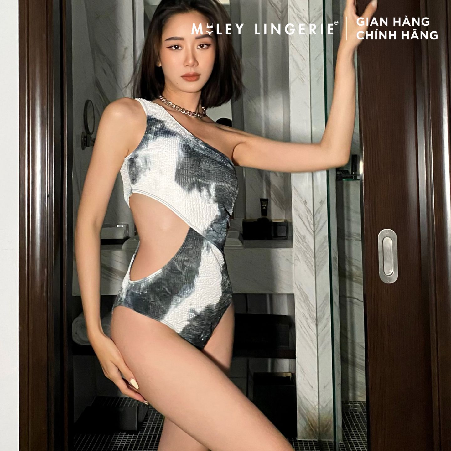 [MUA 2 GIẢM 8%] Đồ bơi Một Mảnh Dành Cho Nữ Cut-out Phối Hai Màu Đen Xám Snowy Mountain Thời Trang Tôn Dáng Miley Lingerie - SPP01