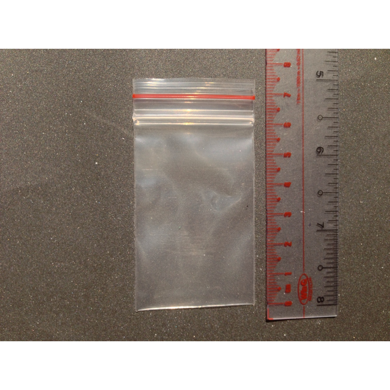 Túi zip chỉ đỏ - Size 4x7 cm