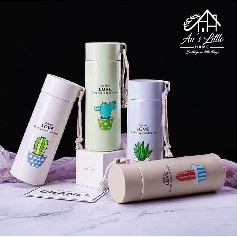 CHAI NƯỚC THỦY TINH VỎ NHỰA IN HÌNH XƯƠNG RỒNG - CÓ DÂY XÁCH ANHOME GIÁ RẺ