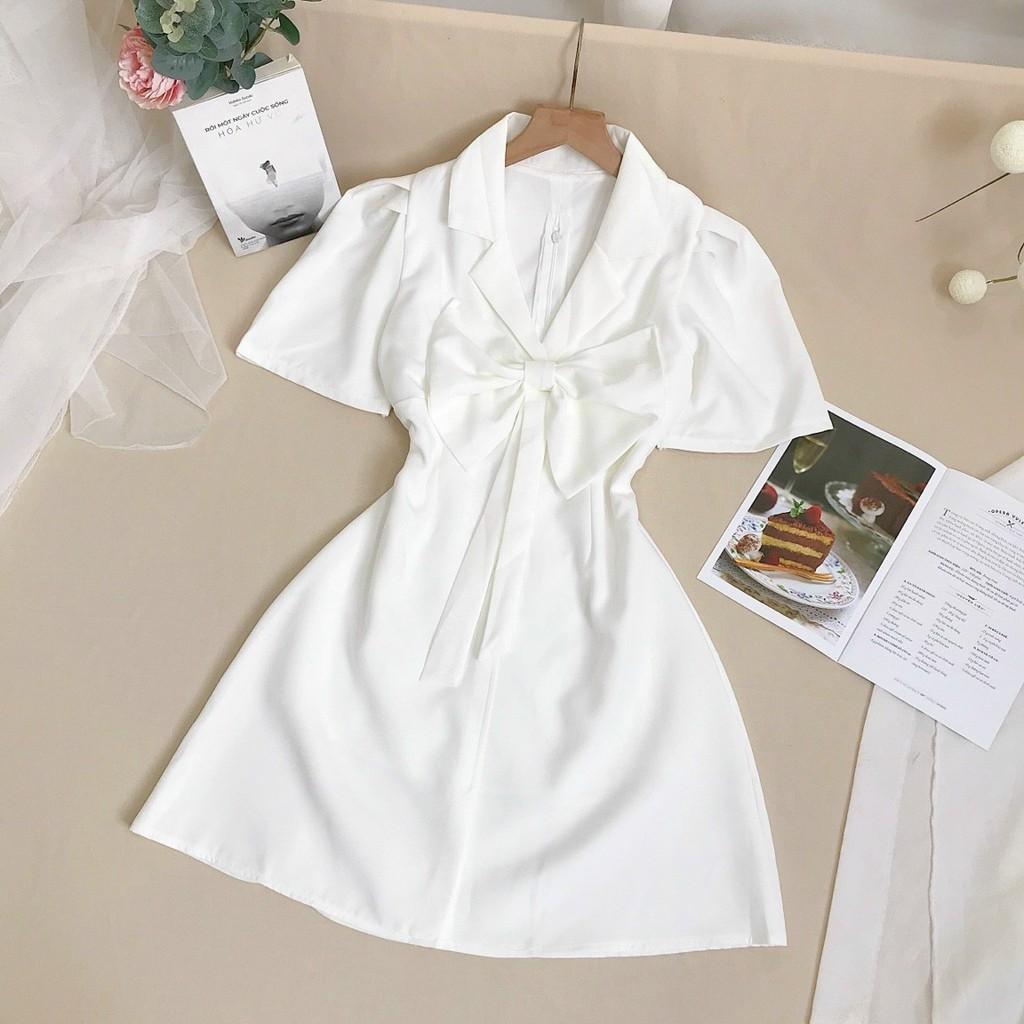 Đầm trắng cổ vest nơ ngực