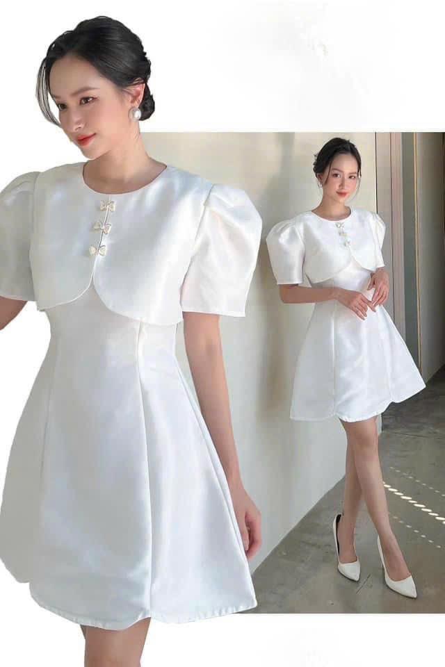 Đầm xoè tafta đắp ngực cài nơ