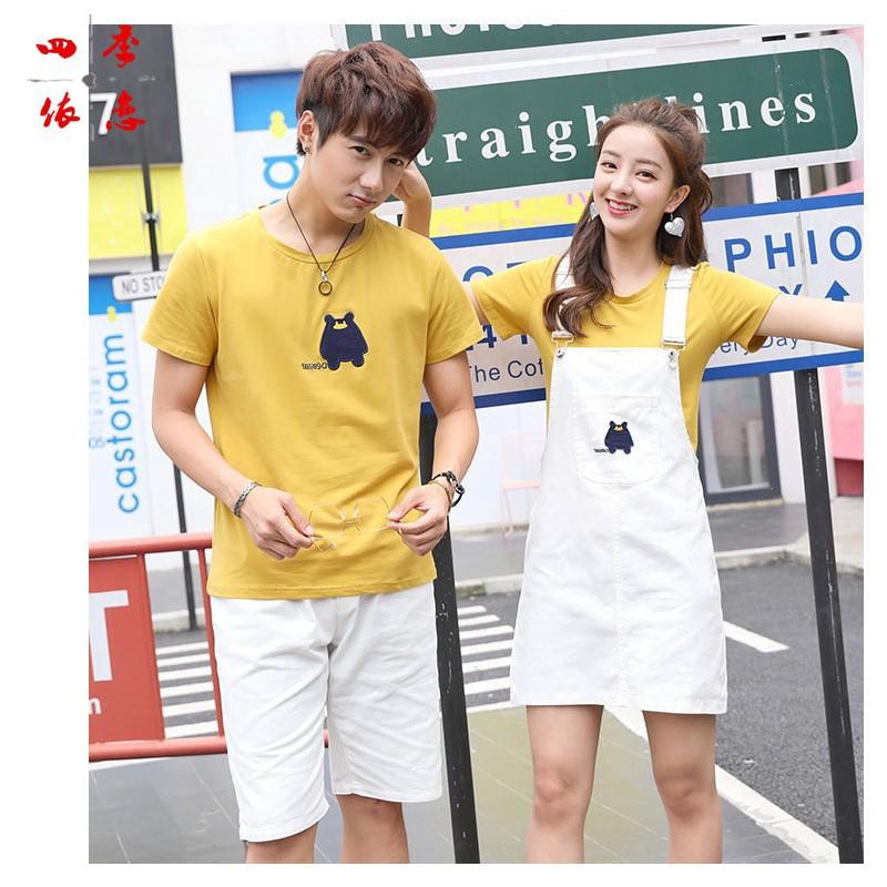 Áo cặp nam nữ ️FREESHIP️ set áo thun đôi màu vàng logo thêu kèm váy yếm và quần short kaki màu trắng đẹp AT31