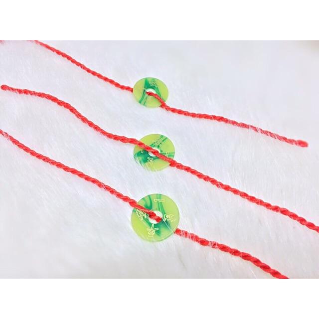 Combo 10 dây đỏ đeo tay 1 đồng cẫm thạch