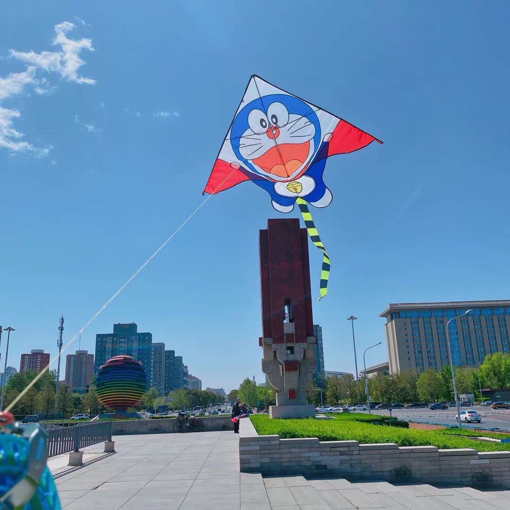 - Diều doremon - Tặng tay cầm thả diều 150m dây + túi vải đựng  doraemon
